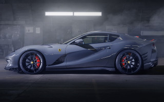 Grey sports car dark garage - a dark garage free wallpaper