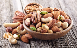 Wooden bowl nuts wooden spoon - a wooden bowl free wallpaper