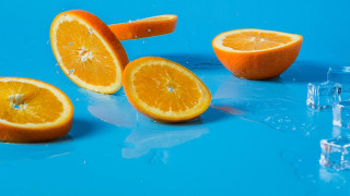 Oranges halved ice blue surface - a group of oranges free wallpaper
