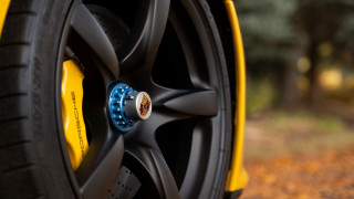 Yellow car tire blue spokes - rim free wallpaper