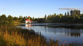 Lake church trees grassy banks - erlund hudson free wallpaper