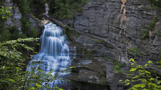 Waterfall man ledge forest moss - a waterfall below free wallpaper