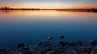 Sunset lake rocks water trees - rock and water free wallpaper