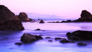 Rocky beach purple sky mountains - a rocky beach free wallpaper