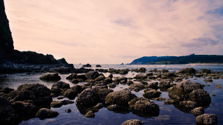 Rocky beach mountain water sky 2 - a rocky beach free wallpaper