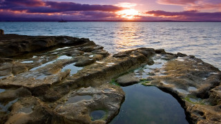 Rock formation water sunset clouds - the middle of it free wallpaper
