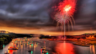 Fireworks river cityscape clouds autumn - free new year wallpaper