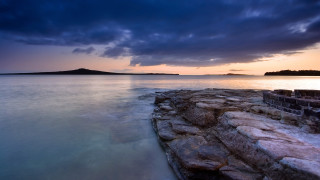 Rocky shore lake island cloudy - a rocky shore free wallpaper