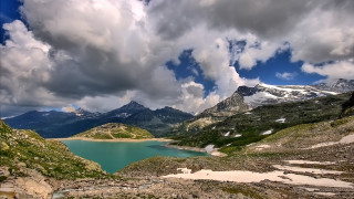Mountain lake cloudy sky rocks 2 - a few rock below free wallpaper