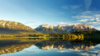 Mountain lake reflection trees sky - a mountain range free wallpaper