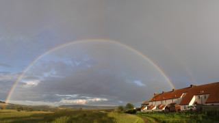 Rainbow rural houses dirtroad grassyfield - david paton free wallpaper