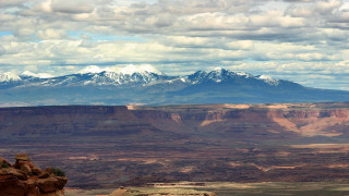 Mountain range snow capped sky - cloudy free wallpaper