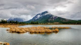 Mountain lake grass cloudy sky - beautiful landscape free wallpaper