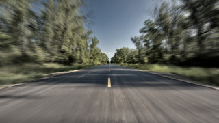Blurry road trees sky water - both side of it free wallpaper