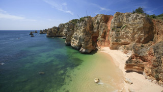 Aquirax uno beach cliff blue - clear blue water free wallpaper