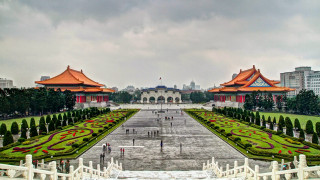 Large garden trees bushes building - a building in the background free wallpaper