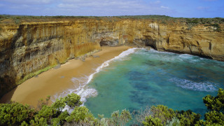 Beach cliff lake forest water - a cliff face free wallpaper