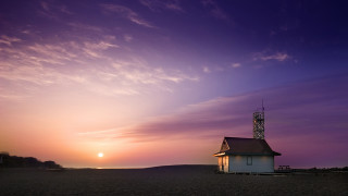Small white building beach sunset - sandy free wallpaper