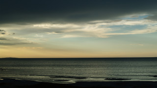 Beach boat cloudy sky ocean - a view of a beach free wallpaper