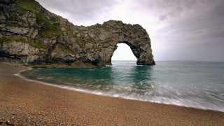 Rock formation beach ocean arch - derold page free wallpaper