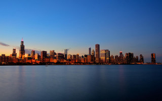 City skyline night blue sky 5 - a blue sky and water free wallpaper