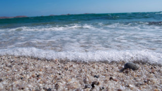 Small rock beach wave blue - free beach wallpaper