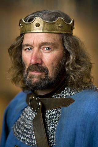 Man blue suit gold crown - romanesque free wallpaper