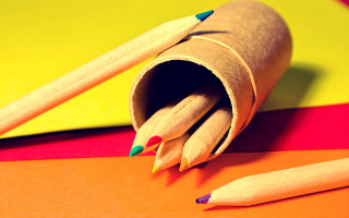Pencils table colorful surface yellow - top of a table next free wallpaper