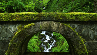Stone arch waterfall mossy wall 2 - andy goldsworthy free wallpaper