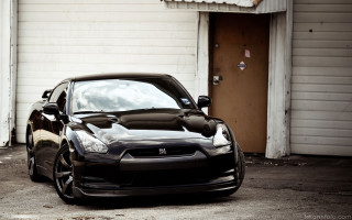Black sports car garage door 2 - matte finish free wallpaper