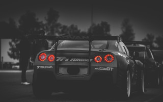 Black white car red lights - photo of a car free wallpaper