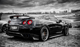 Black white car field cloudy - photo of a car free wallpaper