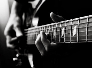 Person playing guitar fingers strings 2 - a guitar free wallpaper