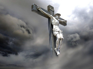 Cross man cloudy sky dark - a cross free wallpaper