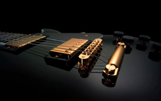 Guitar microphone picker closeup image - a close up of a guitar free wallpaper