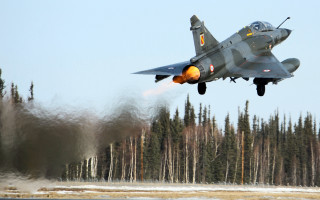 Fighter jet low forest snow - low free wallpaper