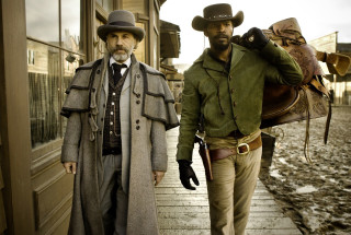 Two men western clothing walking - a street together free wallpaper