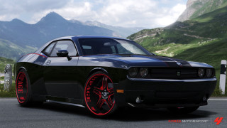 Black car red rims mountain - a mountain range in the background free wallpaper