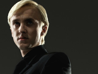 Blonde man black suit serious - a black suit free wallpaper