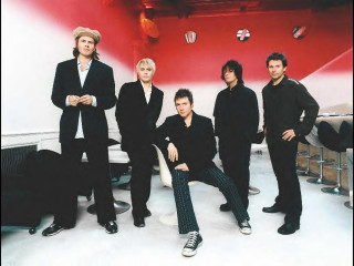 Group people red wall white 3 - andrew bell free wallpaper