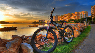 Bike rock wall water boats 3 - sunset free wallpaper