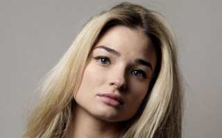 Woman blonde hair white shirt 2 - serious free wallpaper for desktop