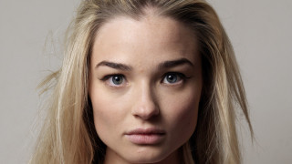 Blonde woman blue eyes serious 3 - her face free wallpaper