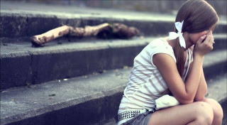 Girl sitting steps hand face - movie still frame free wallpaper