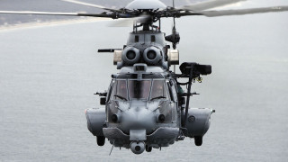 Helicopter flying water above below - over a body of water free wallpaper