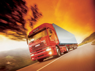 Red truck sunset mountains beach - a red semi truck free wallpaper
