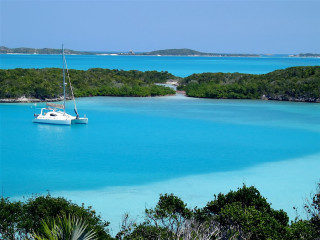 Sailboat lagoon blue water trees - a sailboat free wallpaper