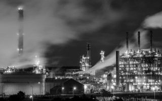 Factory smoke stacks night foggy - a factory free wallpaper