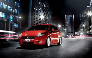 Red car city street night 2 - digital free wallpaper for desktop
