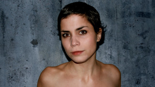 Woman short hair blue background - a short haircut free wallpaper